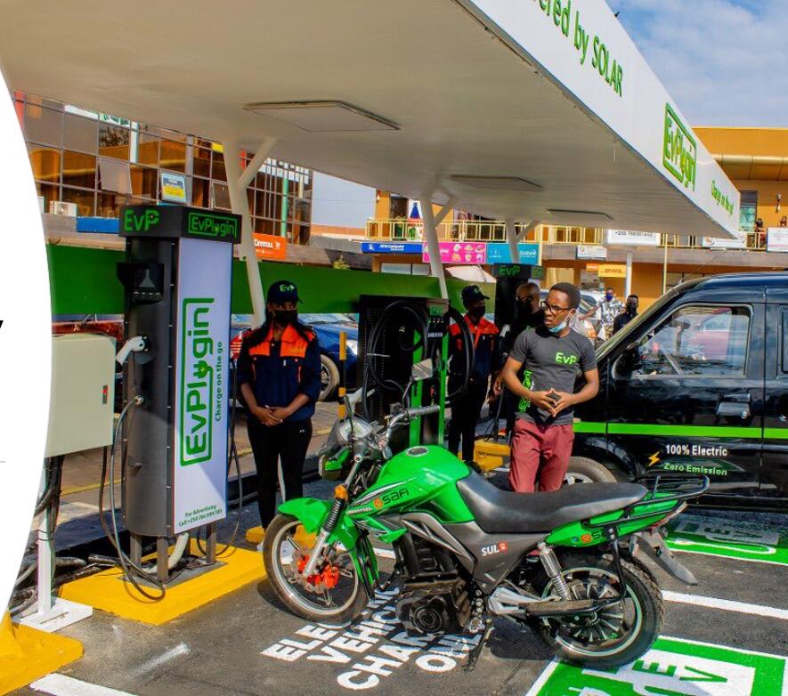 Electric motorcycle at charging station